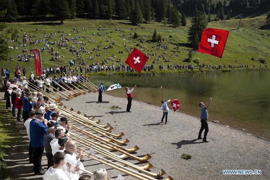 SWITZERLAND-SEEBENALP-SWISS ALPINE HORNS-PLAYING