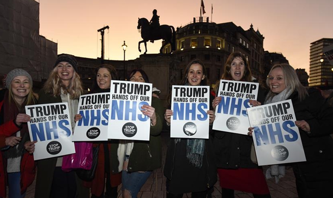 People take part in "No to Trump - No to NATO" demonstration in London