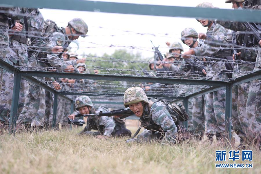 （在习近平强军思想指引下·我们在战位报告·图文互动）（3）千里移防，铁心跟党走——南部战区陆军第75集团军某红军旅政治建军、练兵备战记事